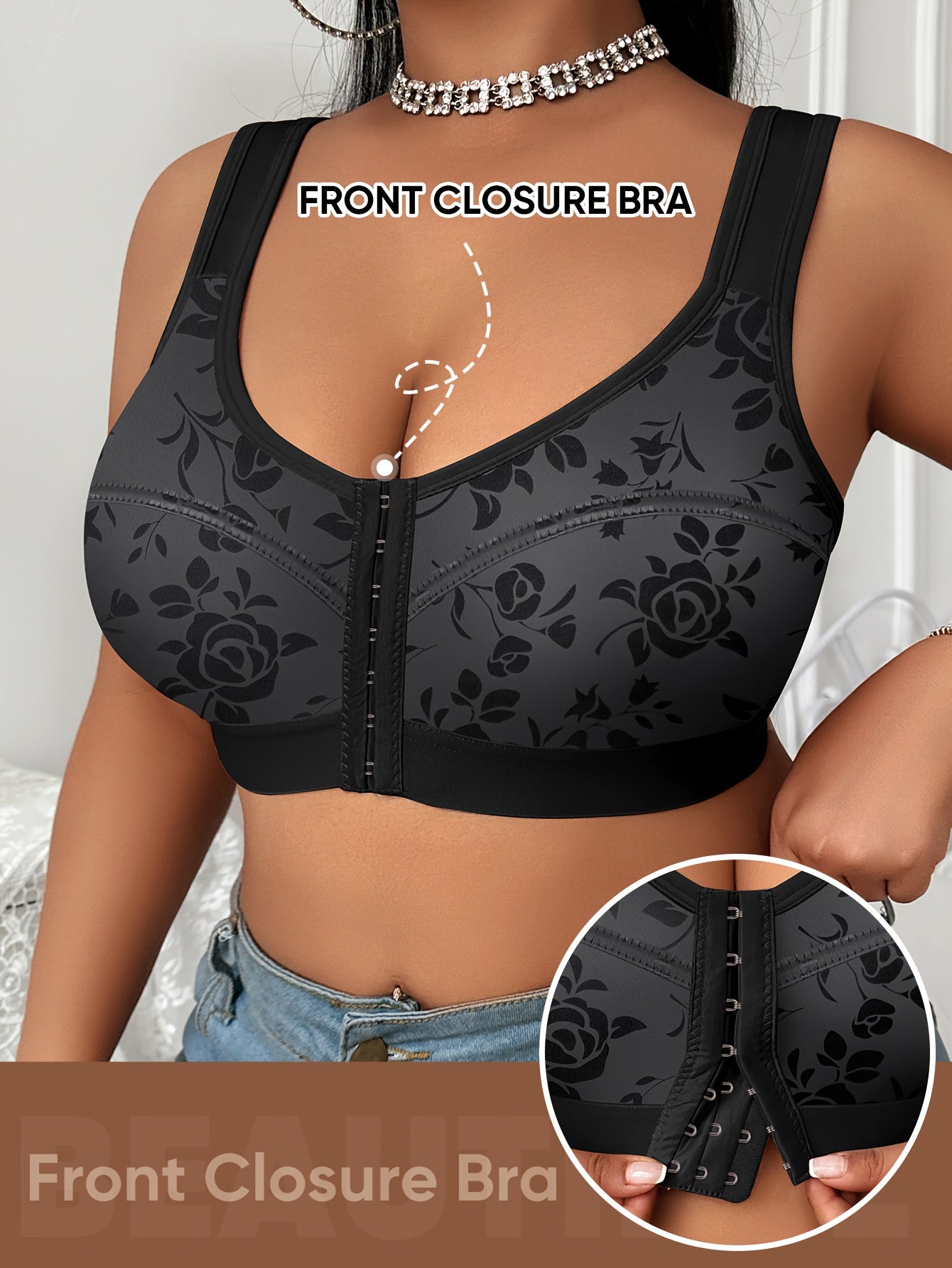 The front view of a woman wearing a black sports bras for big chests sold by 100 Spartans with front closure and wider shoulder straps.