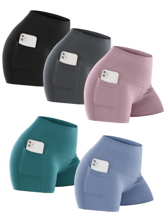 Set of five colorful biker shorts with pockets on a white background