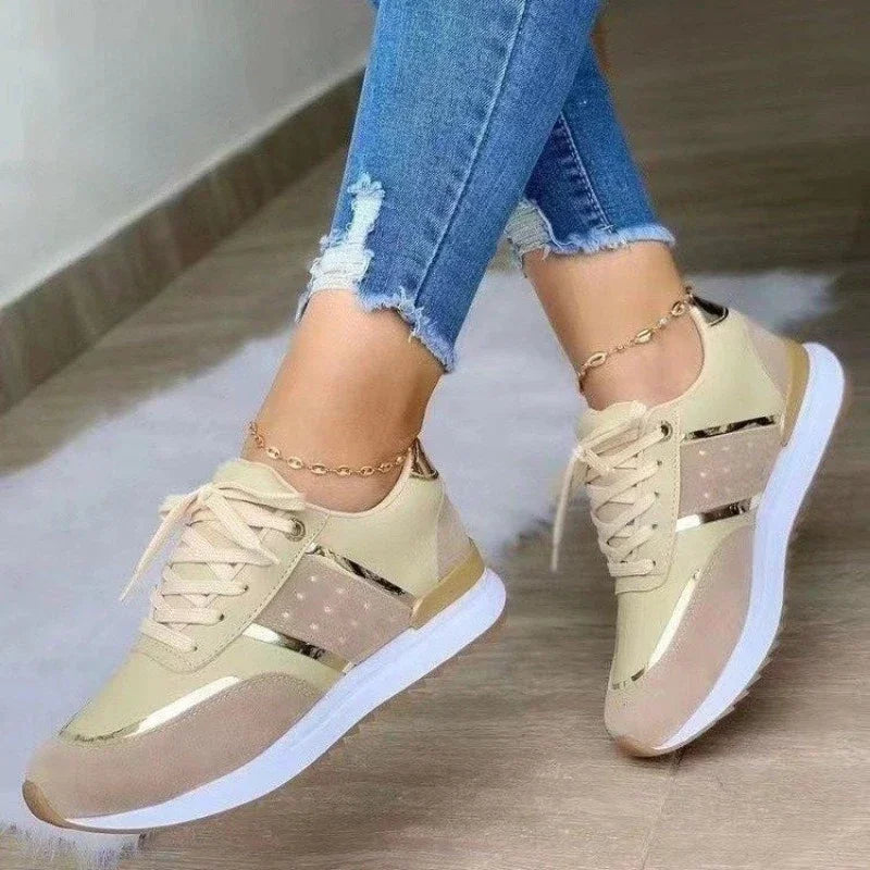 A black casual women sneakers sold by 100 Spartans