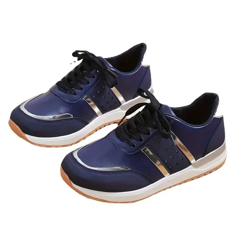 A blue casual women sneakers sold by 100 Spartans