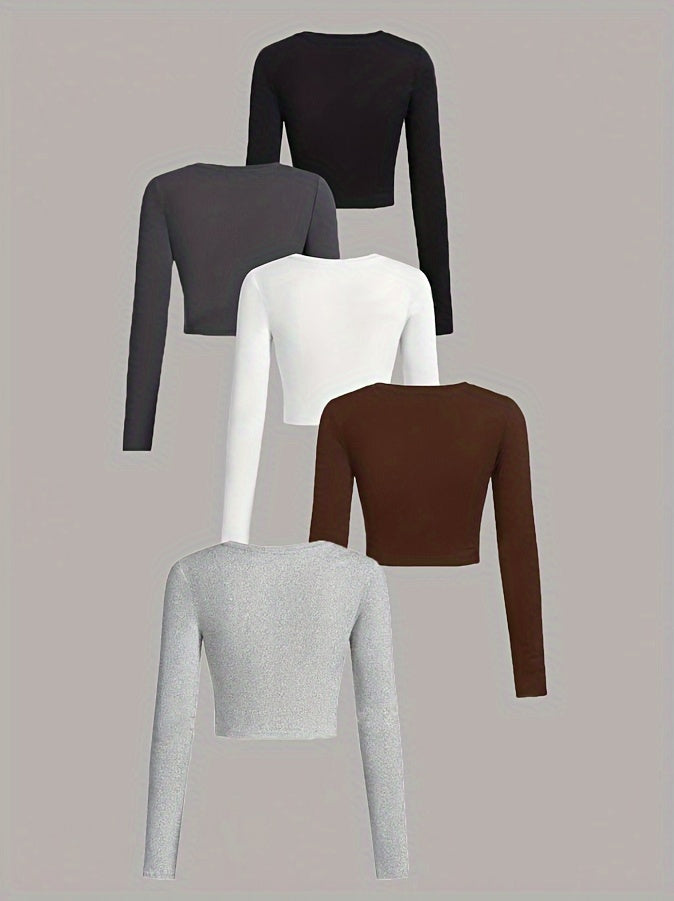 Set of five long-sleeve crop tops in black, gray, white, brown, and gray on a beige background.