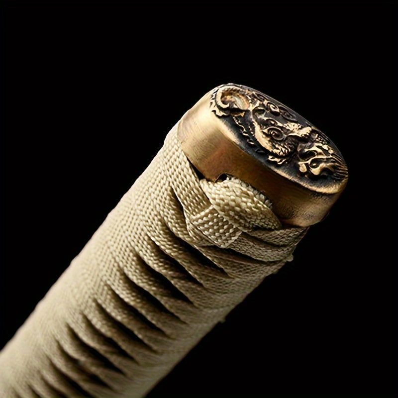 Close-up of a antique Japanese Samurai Katana sword handle with intricate design on a black background