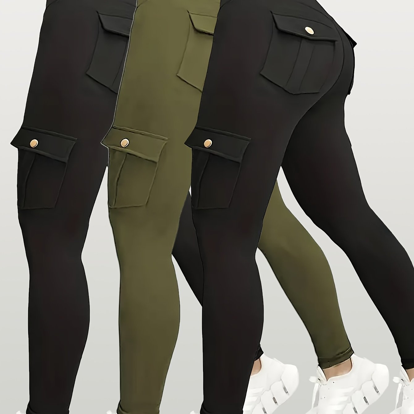 Three pairs of yoga leggings in black, green, and a mix of both on a light gray background.