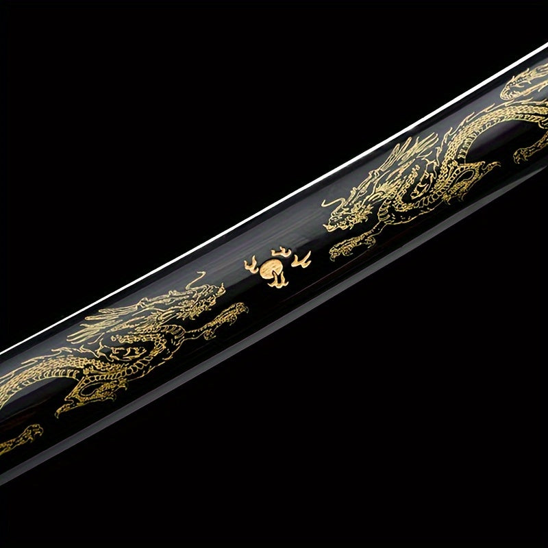 Antique Japanese Samurai Katana sword scabbard with gold dragon designs on a black background