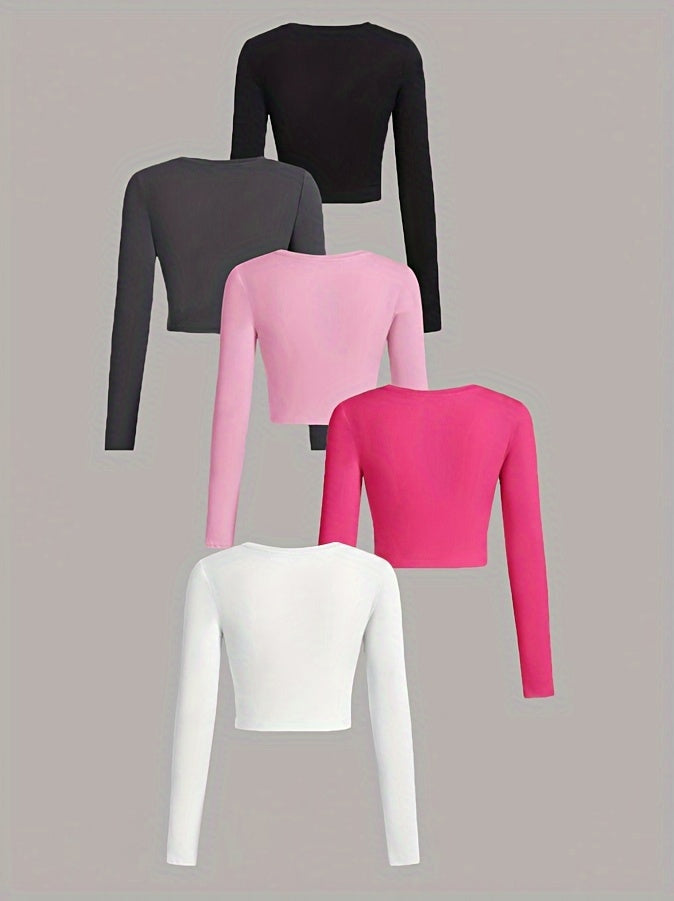 Five long-sleeve crop tops in black, gray, pink, white, and magenta on a light gray background.