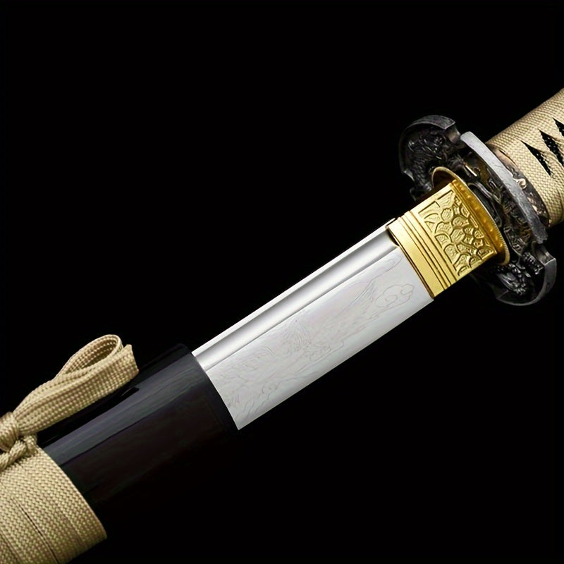 Antique Japanese Samurai Katana Sword with gold and silver blade on a black background