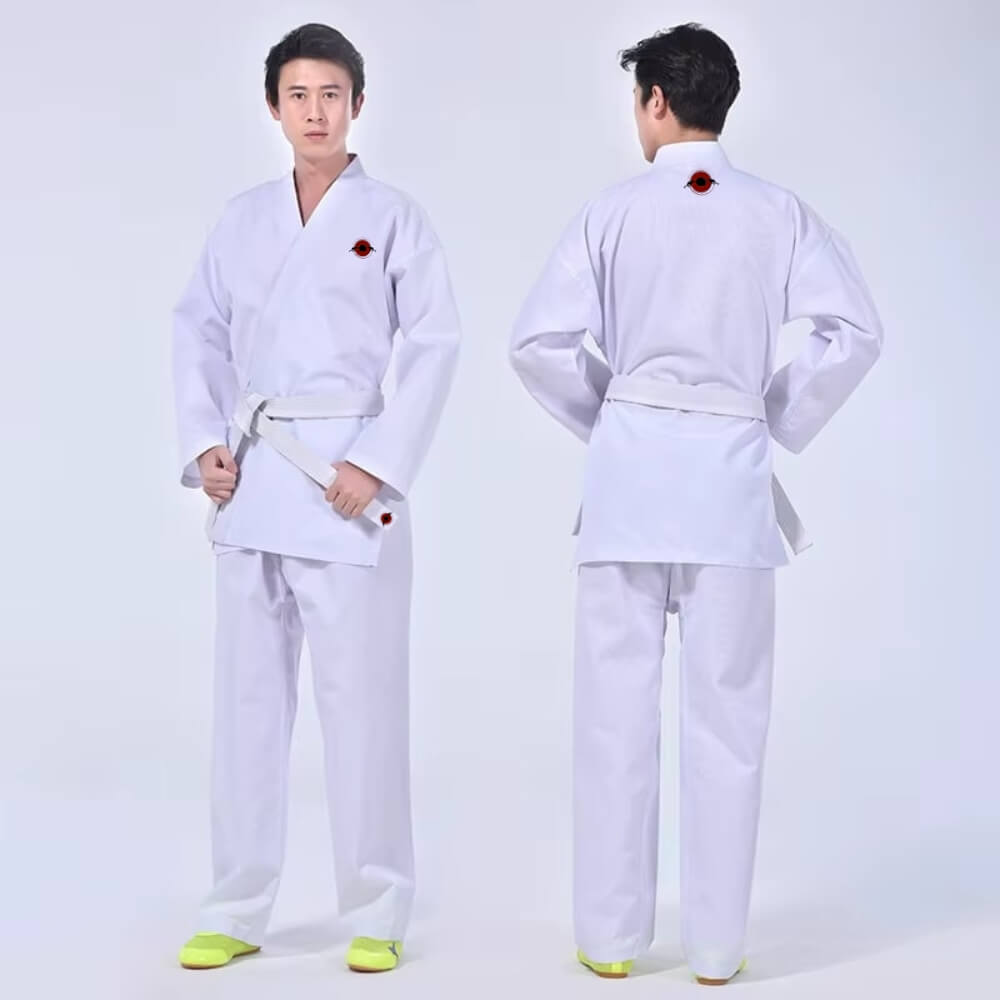 A man wearing a Kumite Karate Uniform sold by 100 Spartans