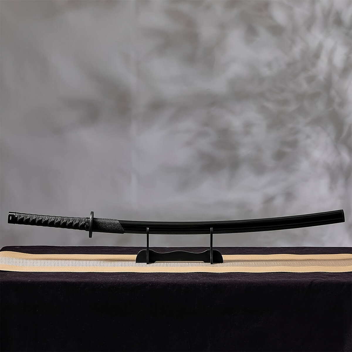 Training sword on a stand with a blurred background