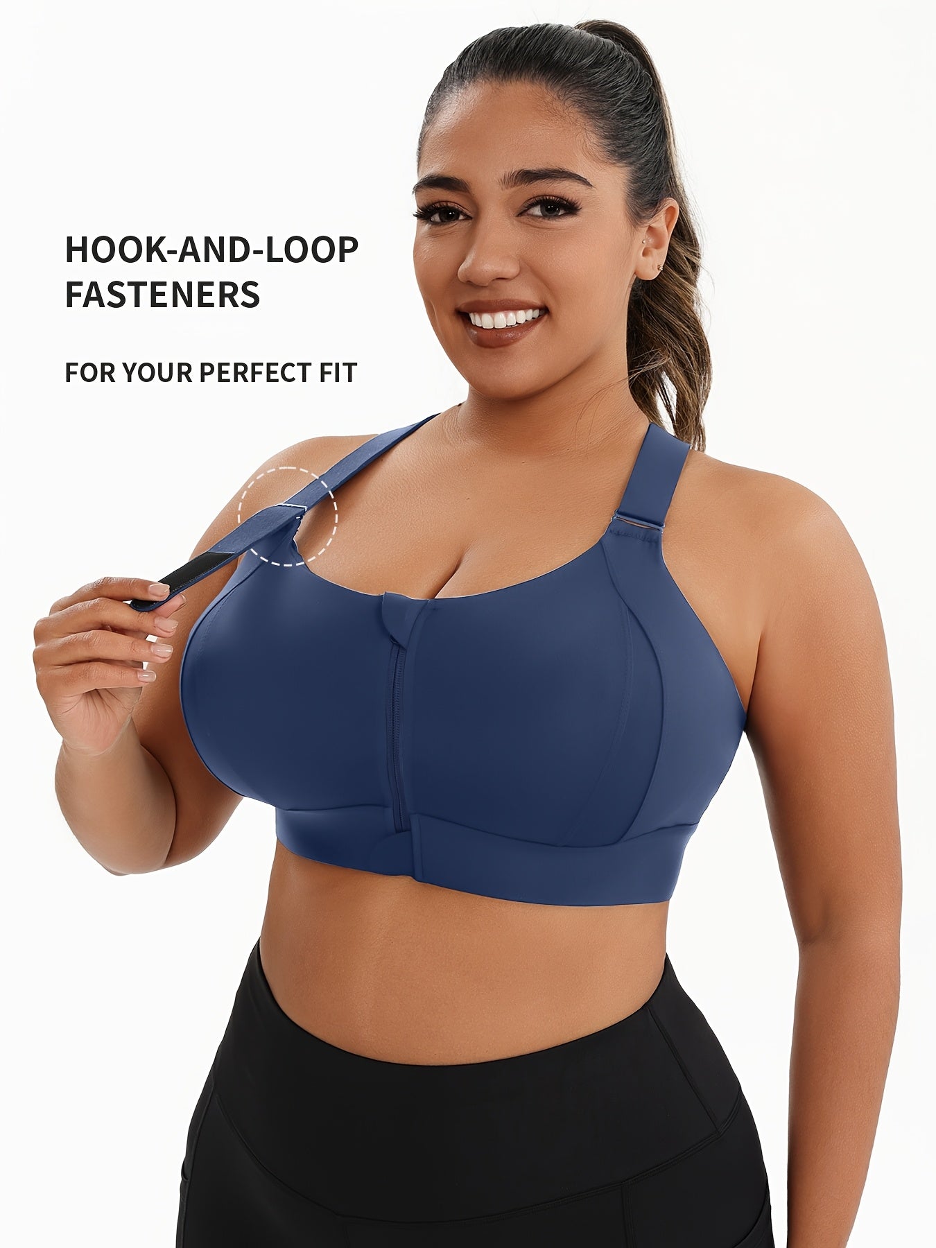 A woman wearing a blue plus size sports bras with criss-cross back design sold by 100 Spartans