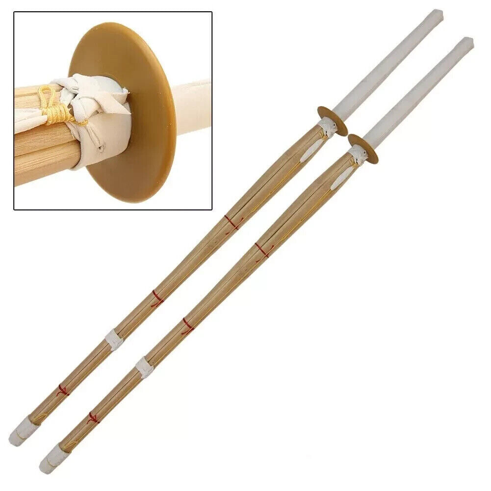 Two bamboo practice swords with white tips and red accents on a white background, with an inset showing a close-up of the handle.