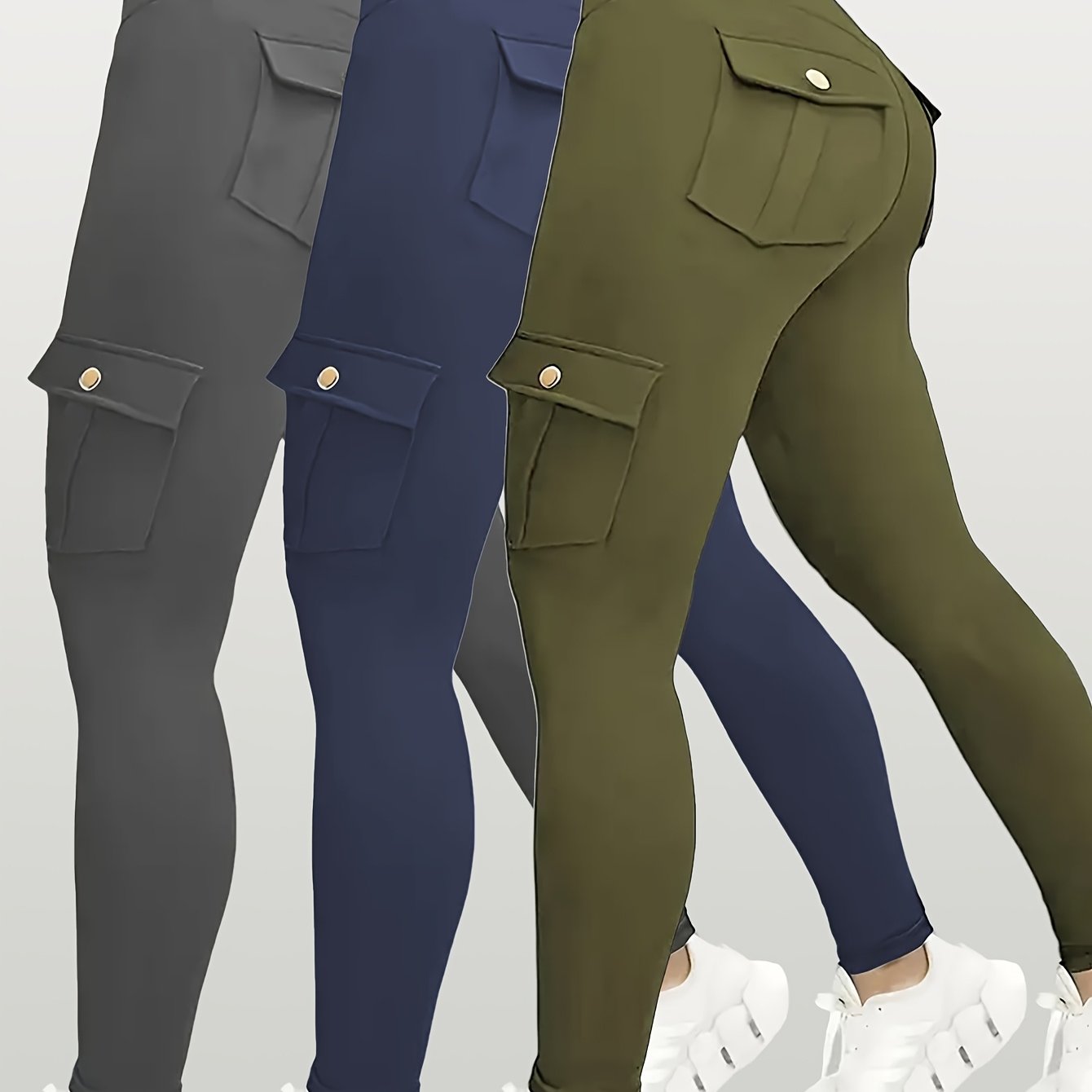 Three pairs of yoga leggings in gray, navy, and green on a white background