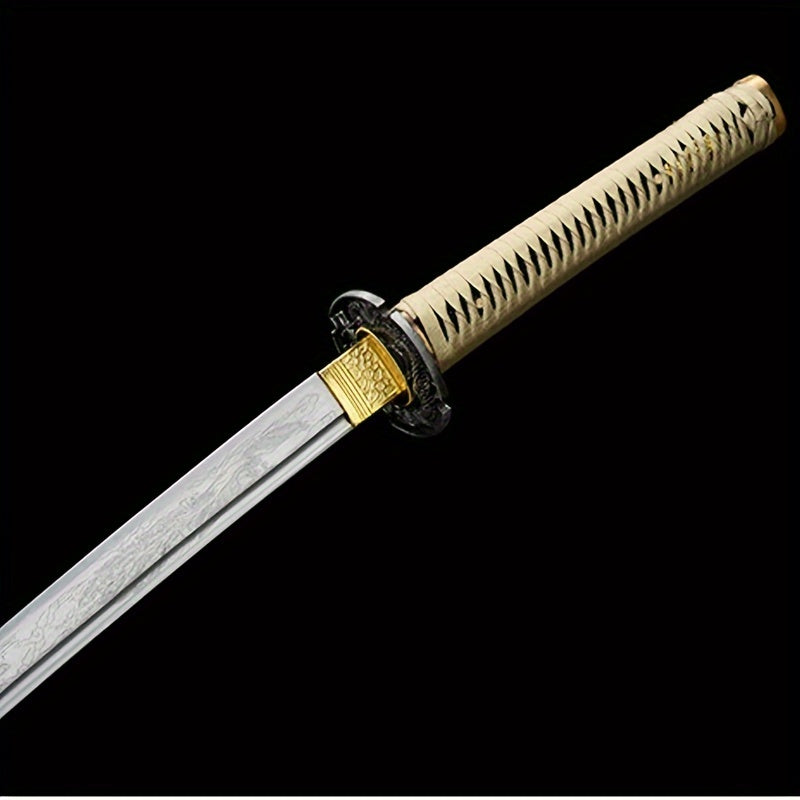 Antique Japanese Samurai Katana sword with decorative handle on a black background