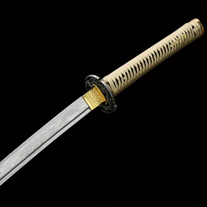 Antique Japanese Samurai Katana sword with gold hilt on a black background