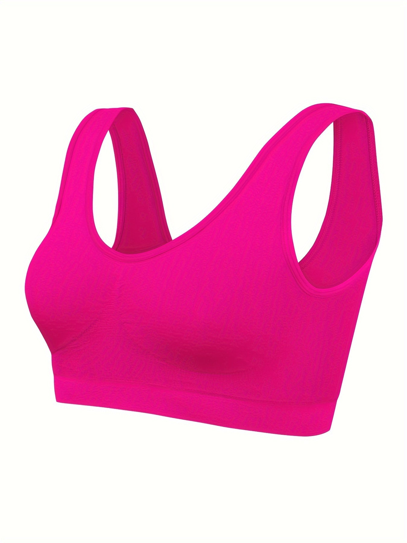 A front view of a pink Padded Sports Bra For Women sold by 100 Spartans on a white background