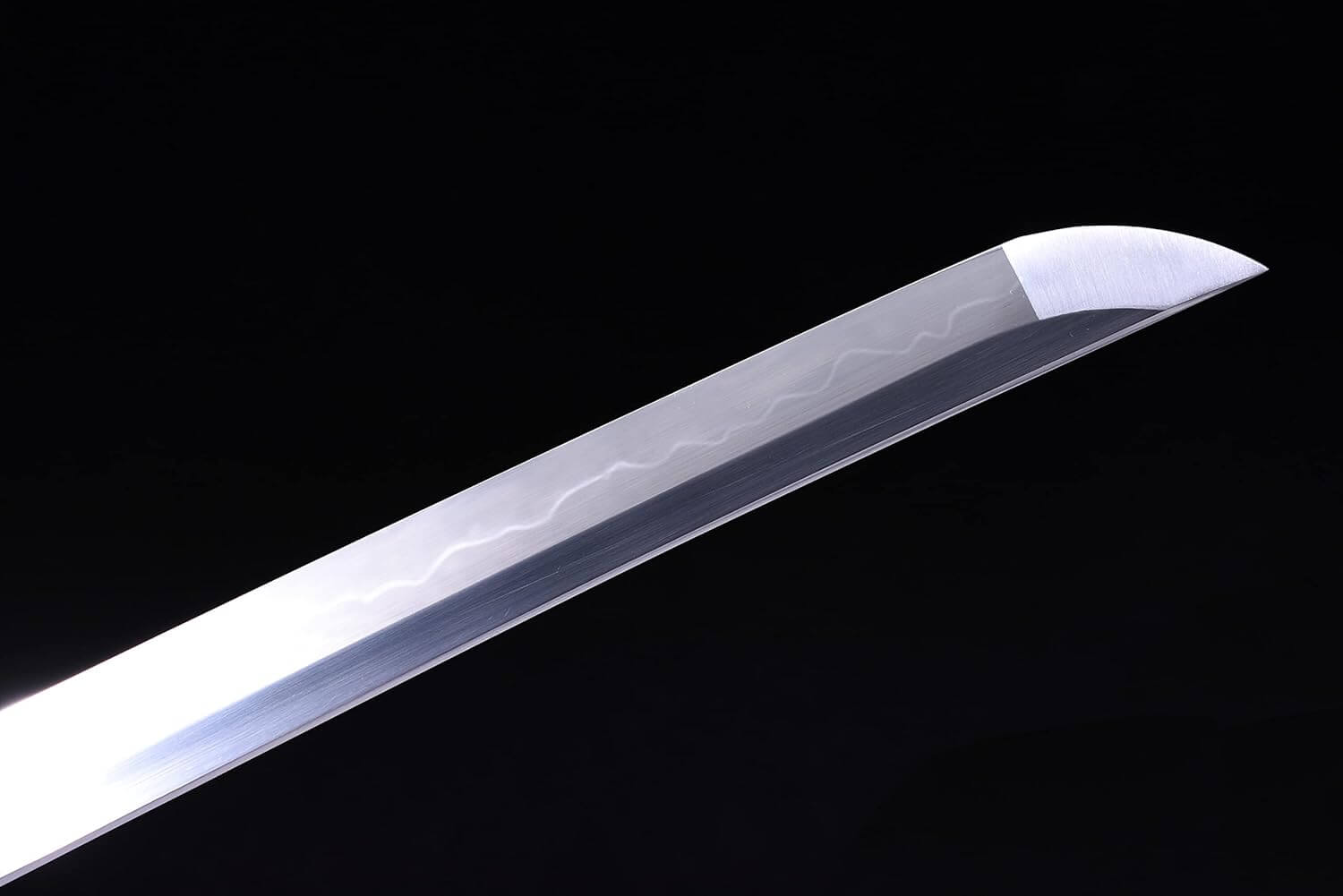 Training sword blade on a black background