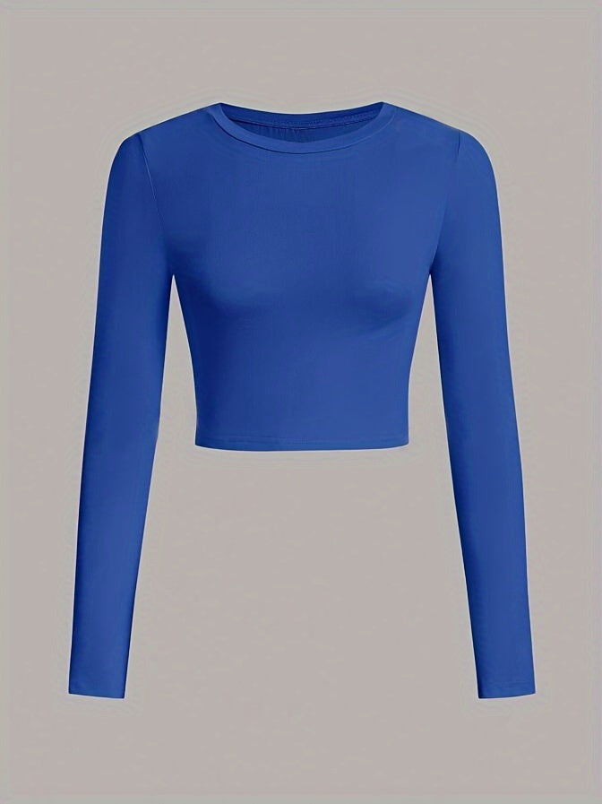 Blue long-sleeve crop top on a gray background