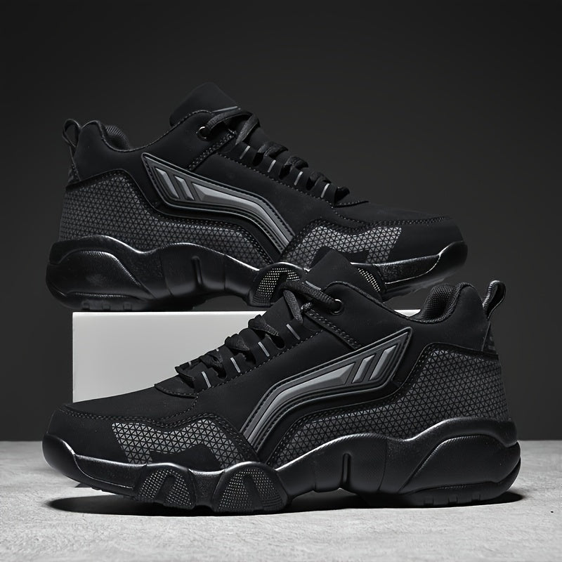 Black athletic shoes with gray accents on a dark background