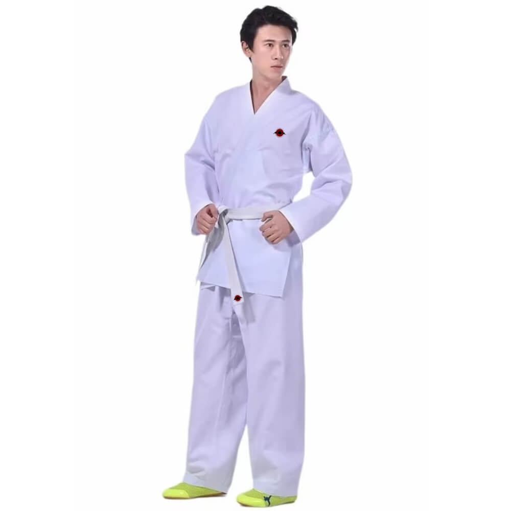 A man wearing a Kumite Karate Uniform sold by 100 Spartans