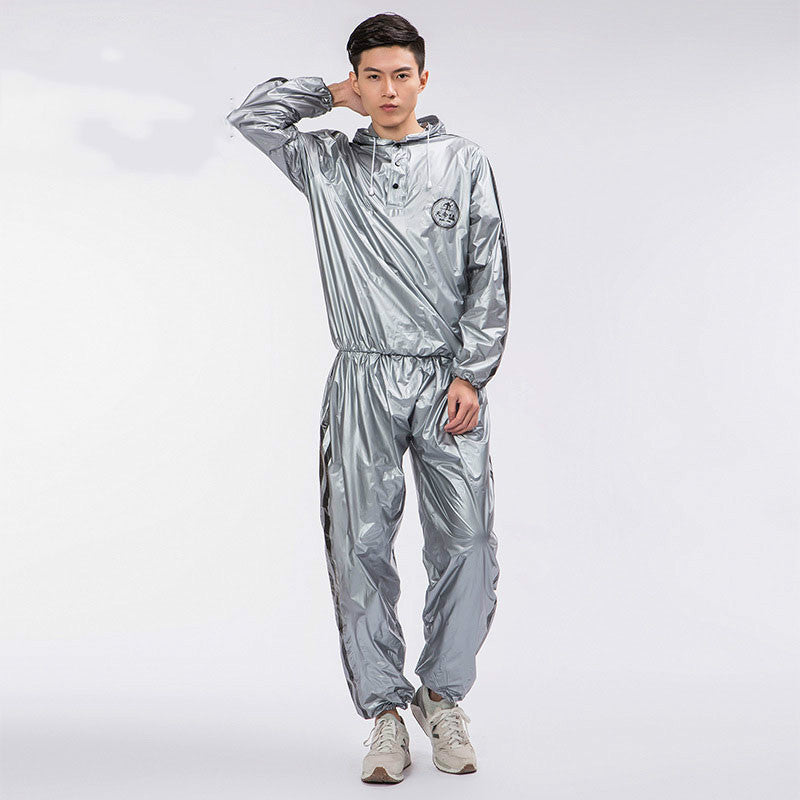 Person wearing a silver reflective suit on a white background