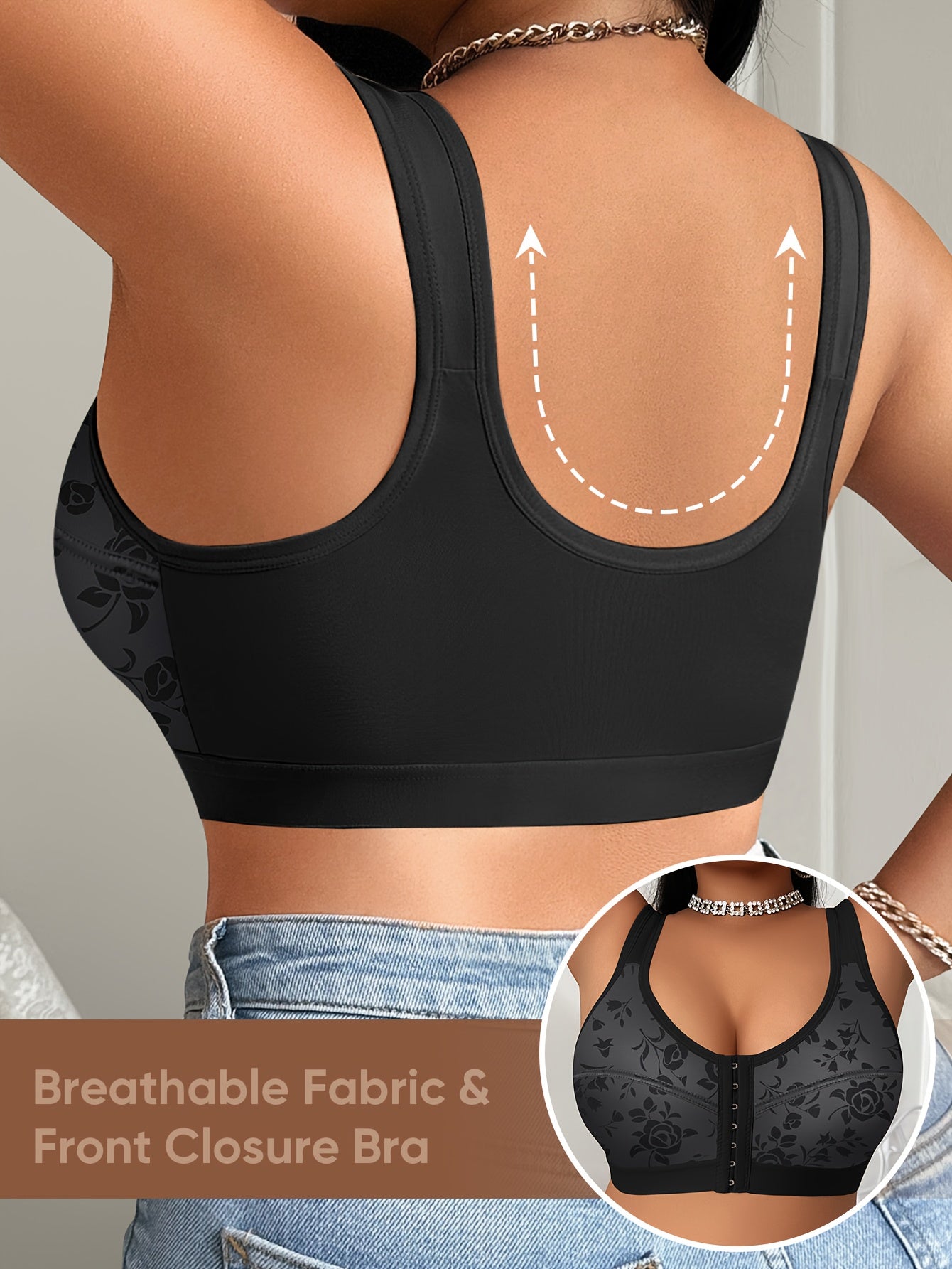 The back view of a woman wearing a black sports bras for big chests sold by 100 Spartans with front closure and wider shoulder straps.