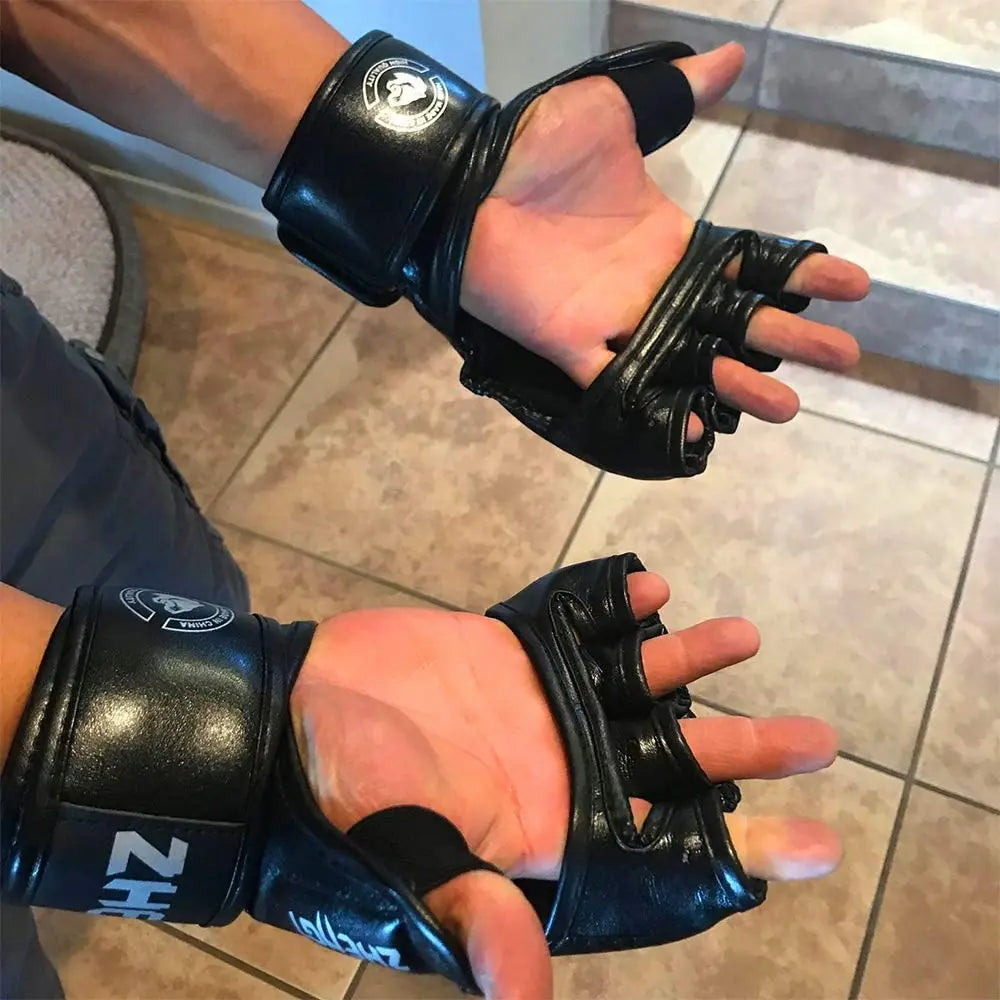 Black muay thai gloves sold by 100 Spartans.