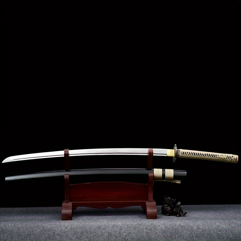 Antique Japanese Samurai Katana sword on a wooden stand with a black background