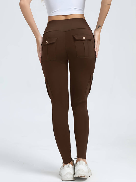 The back view of a woman wearing a pair of brown yoga legging sold by 100 Spartans