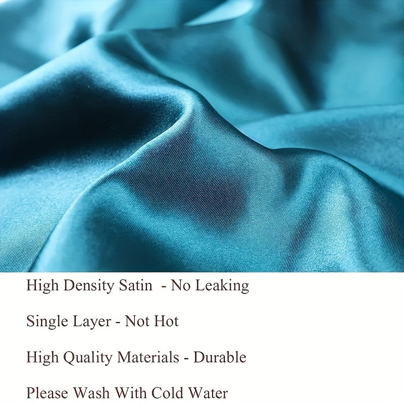 Close-up of blue satin fabric with text about fabric properties.