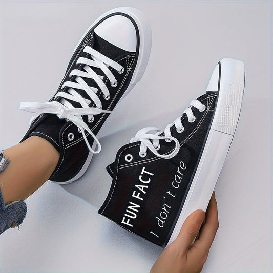 Black and white women's sneakers sold by 100 Spartans