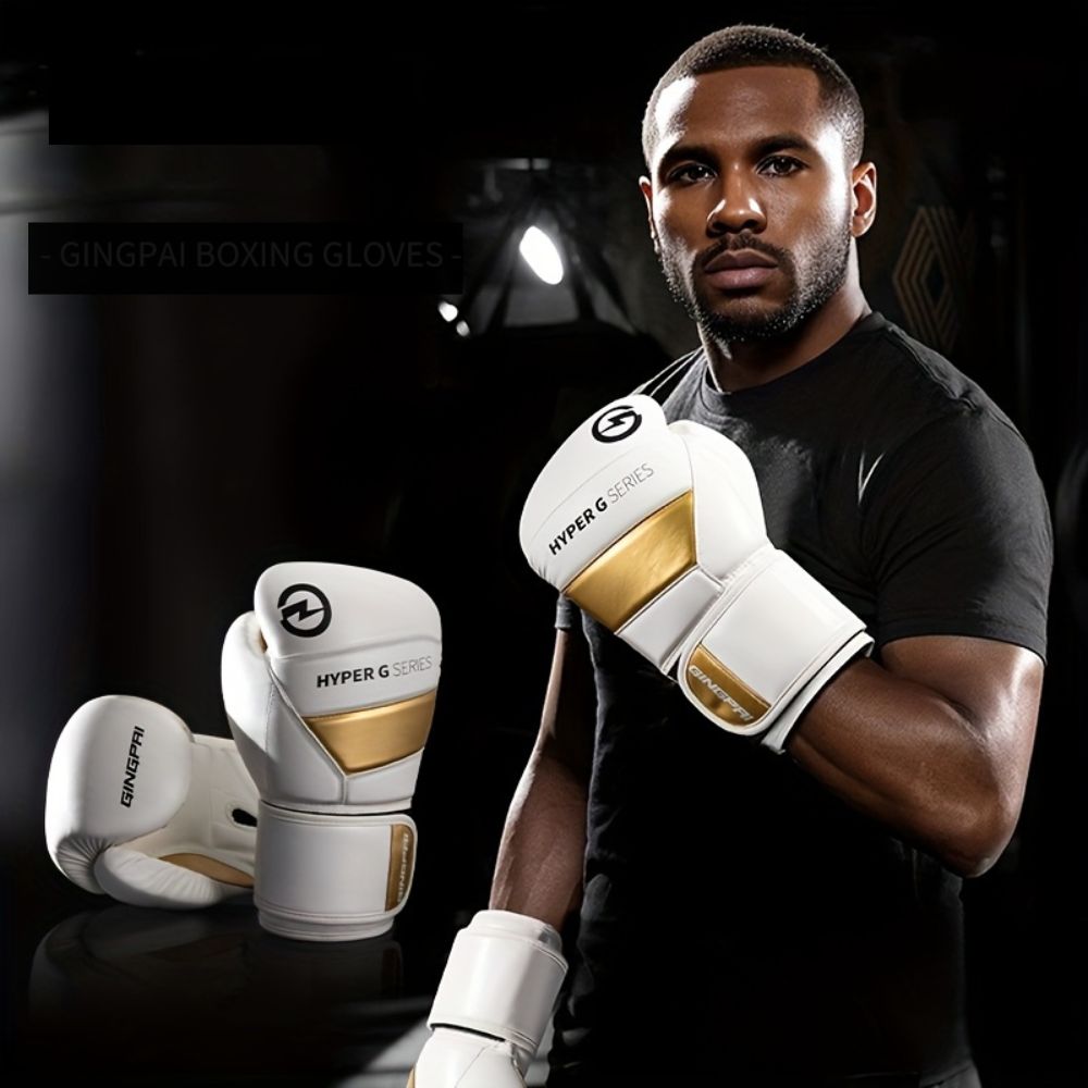 A man wearing a pair of Plain boxing gloves sold by 100 Spartans