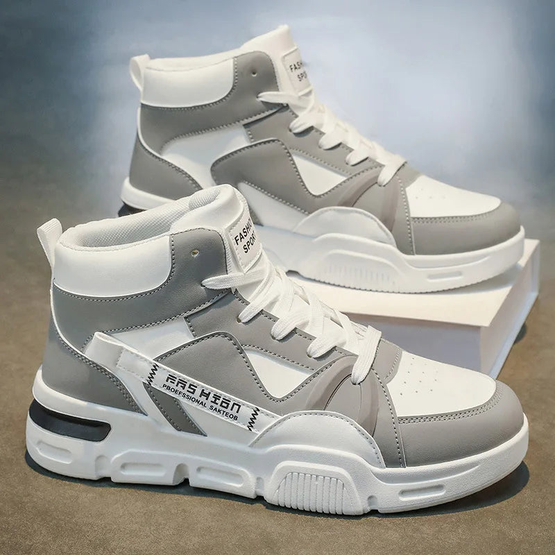 Gray and white high-top sneakers on a gradient background