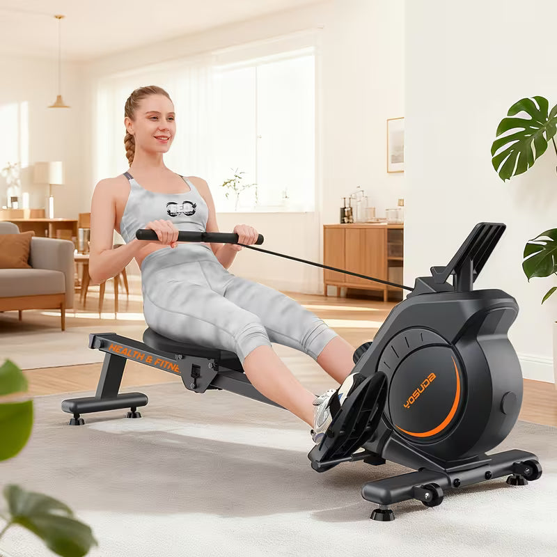 A woman working out with a magnetic rowing machine sold by 100 Spartans