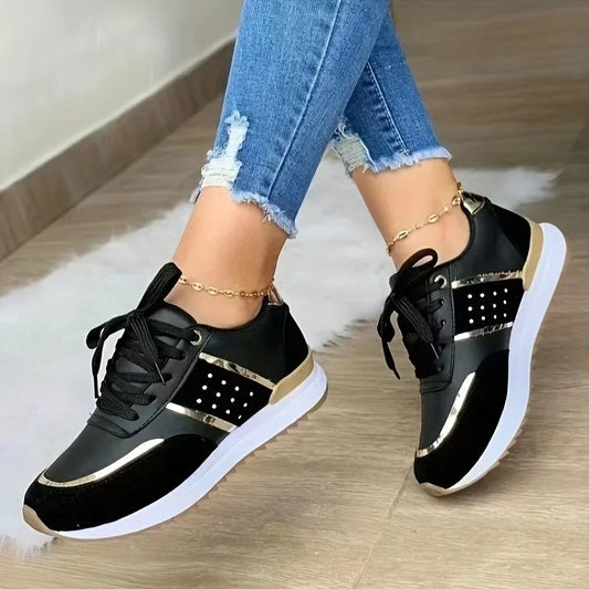 A black casual women sneakers sold by 100 Spartans