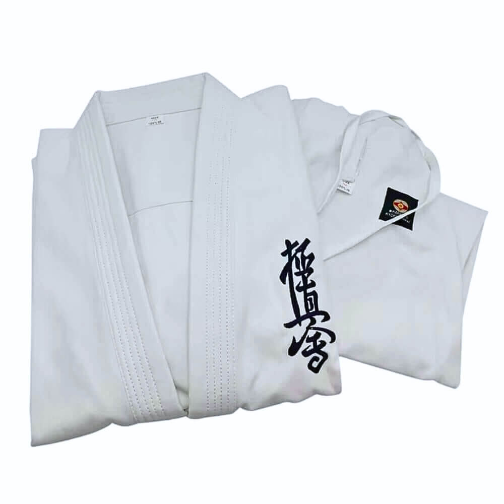 A folded 12oz Kyokushin Karate Uniform sold by 100 Spartans