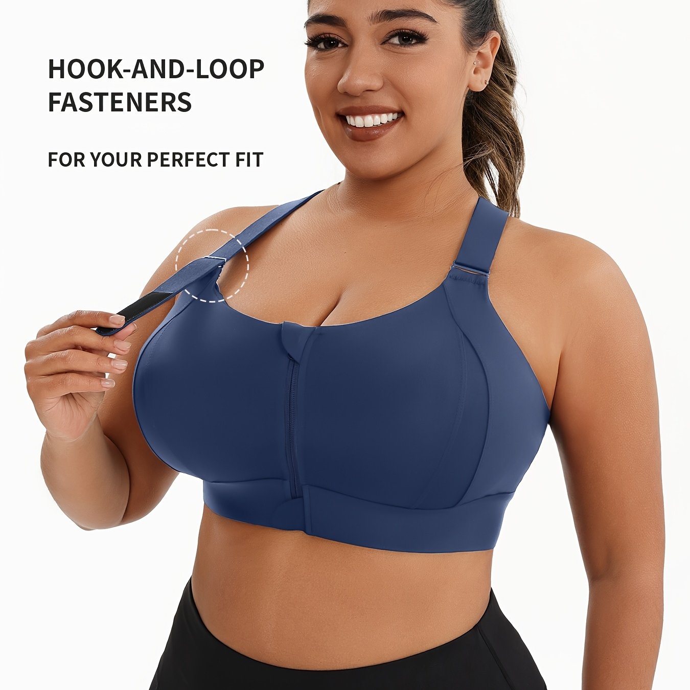 A woman wearing a blue plus size sports bras with criss-cross back design sold by 100 Spartans