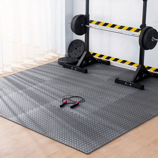A black interlocking floor mats gym​ setting