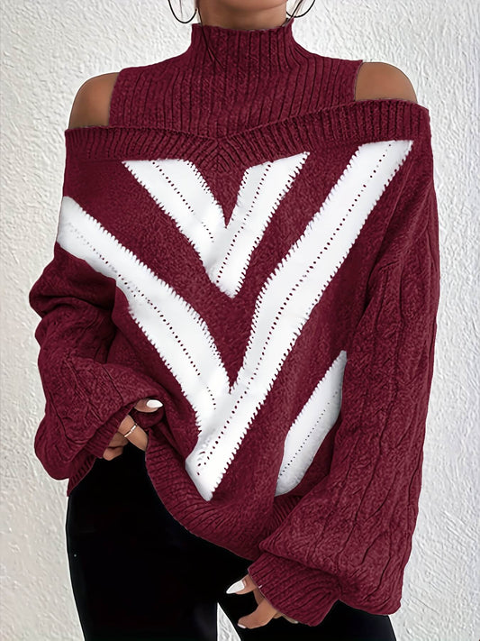 Maroon off the shoulder sweater with white V-shaped design on a plain background