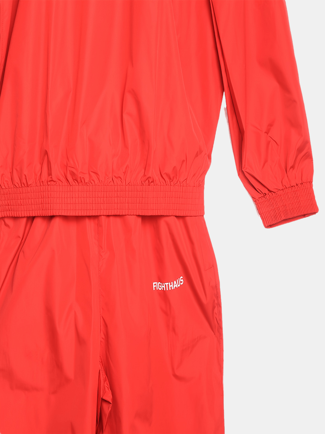Red mens sauna sweat suit with 'FIGHTHAUS' logo on a white background
