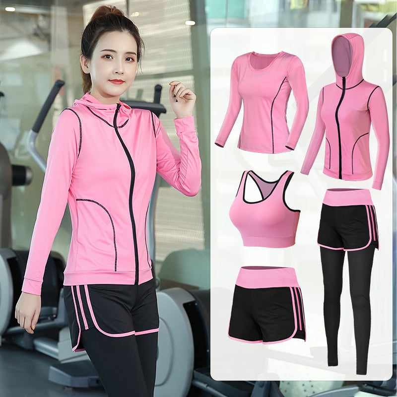 Woman in pink 5 Piece Yoga Clothes For Women with fitness equipment in the background