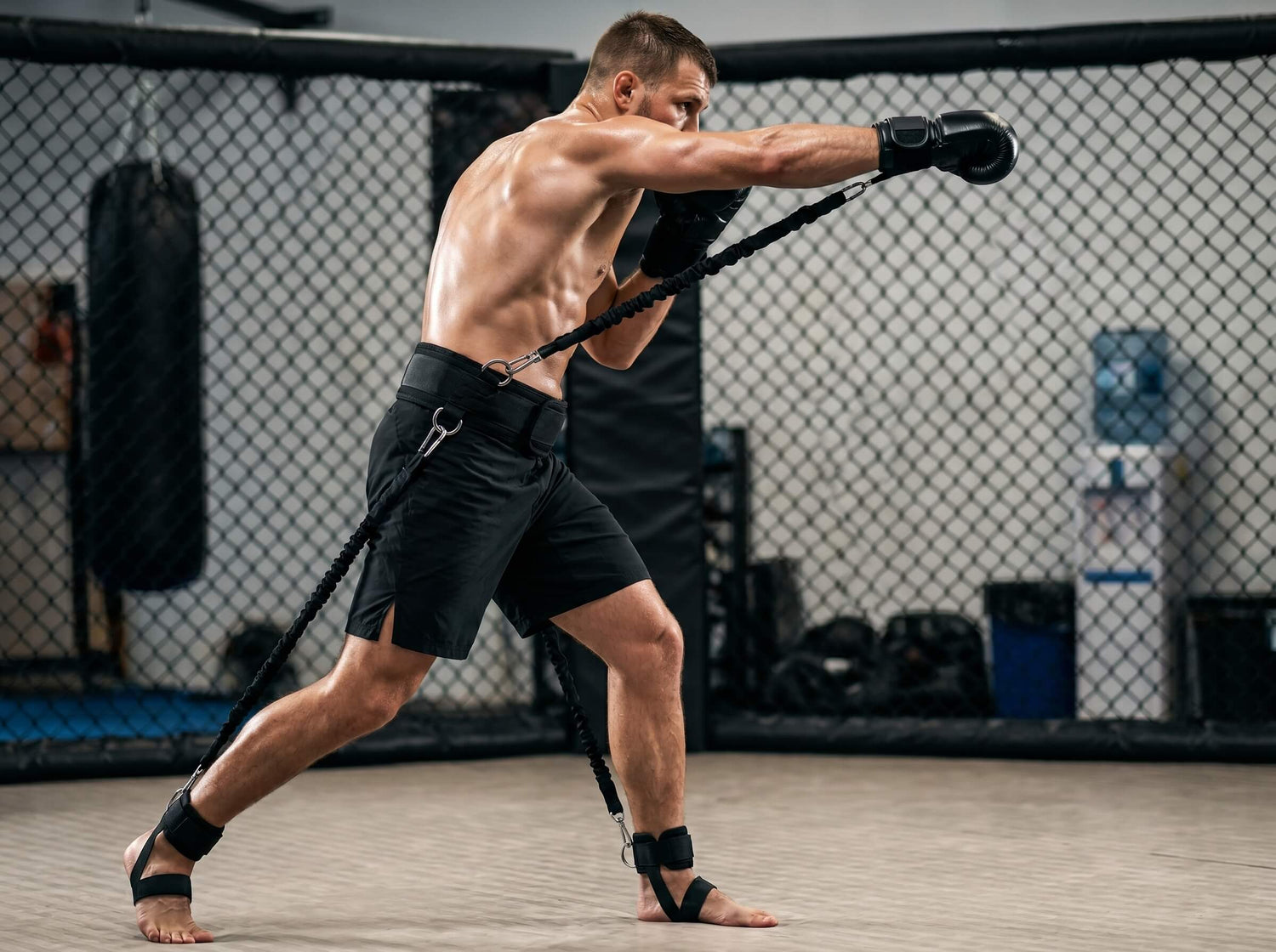 Athlete using resistance bands in a gym setting