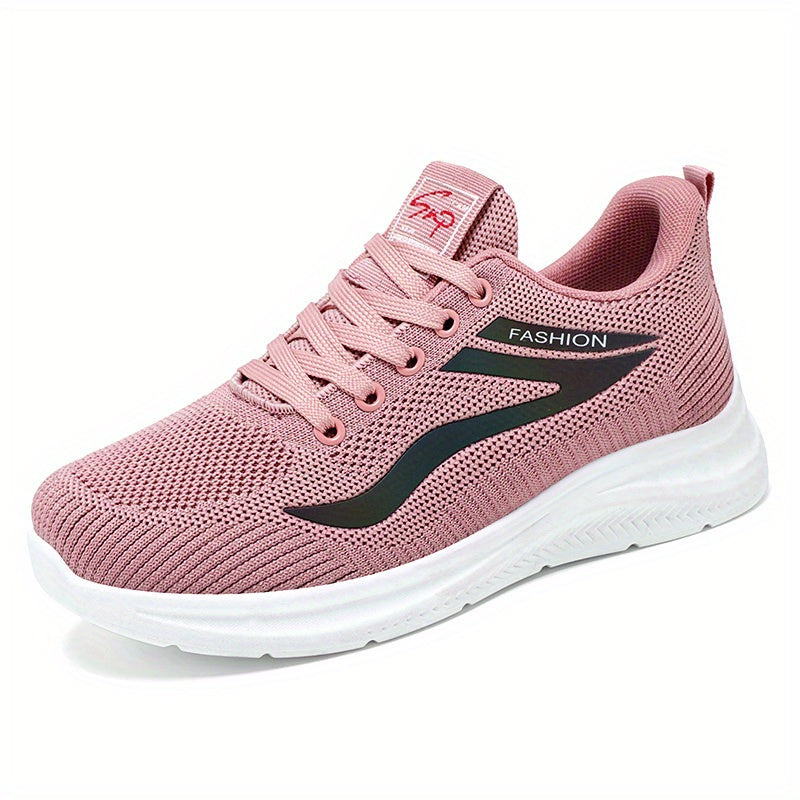 Pink running shoe with a white sole on a white background