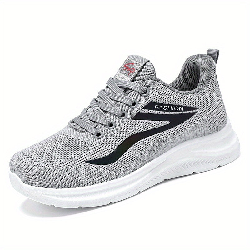 Gray running shoe with white sole on a white background