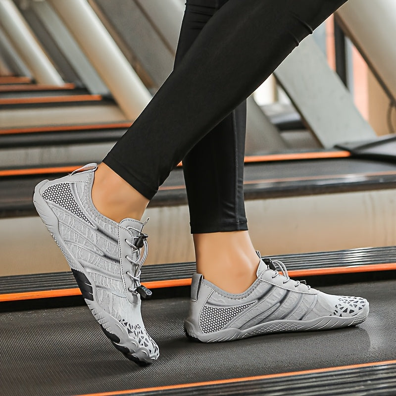 Person wearing a gray deadlift shoes on a treadmill.