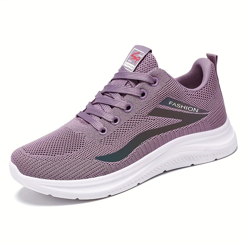 Purple running shoe with white sole on a white background