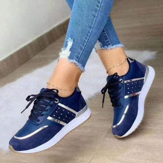 A blue casual women sneakers sold by 100 Spartans