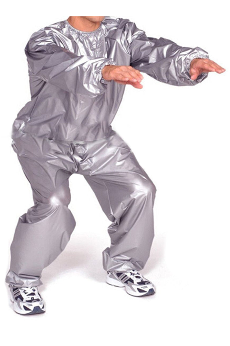 Person wearing a silver reflective suit on a white background