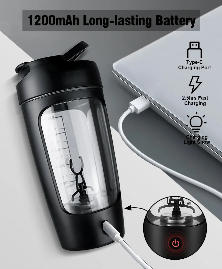 A black blender water bottle being charged with a laptop.