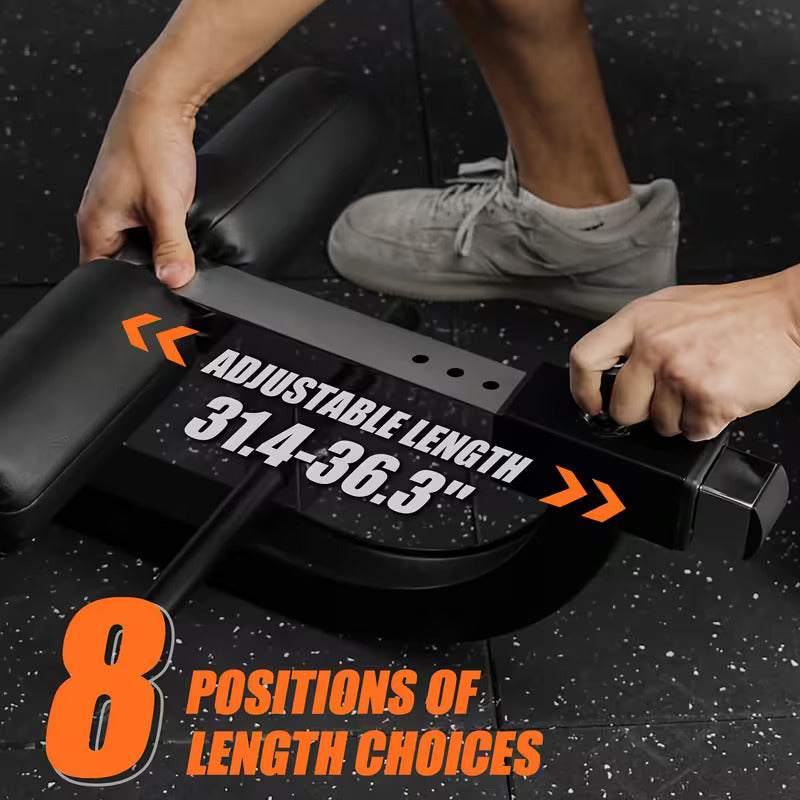 A hand adjusting a leg curl extension machine sold by 100 Spartans