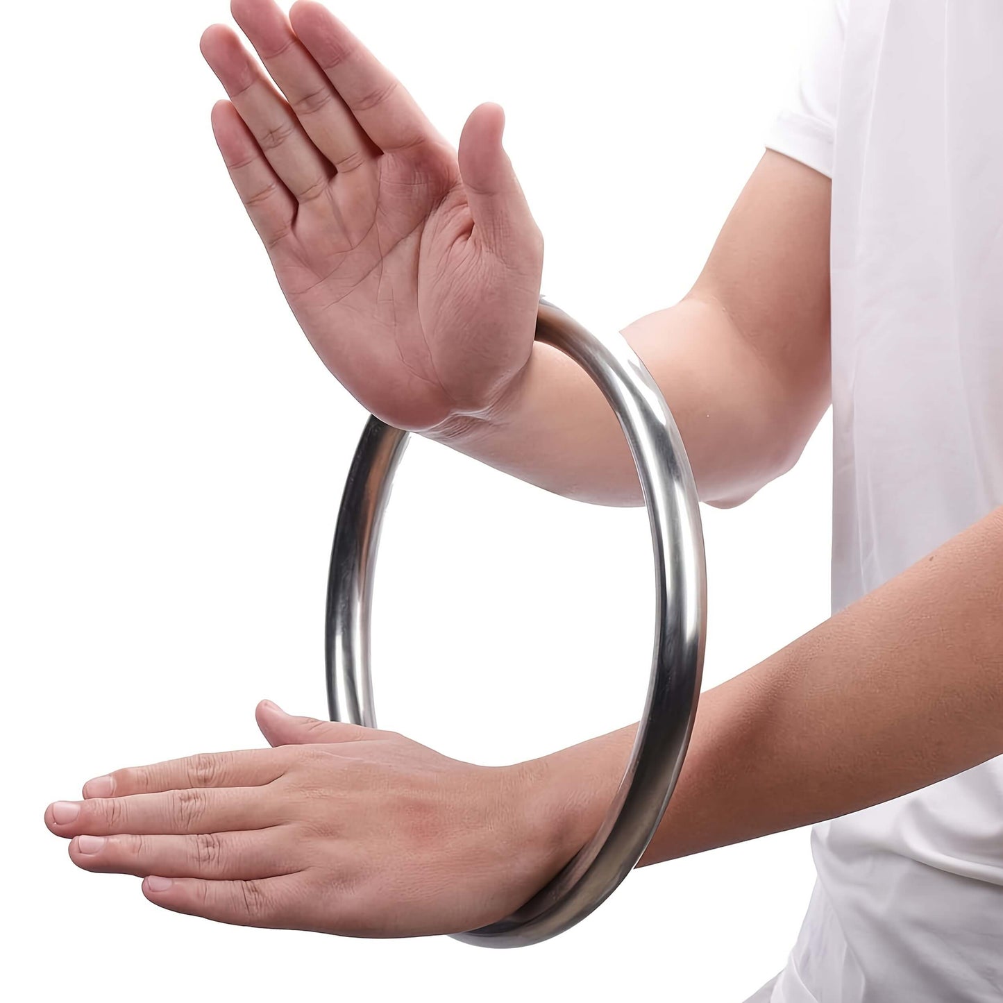 A person training with a wing chun ring with a plain background