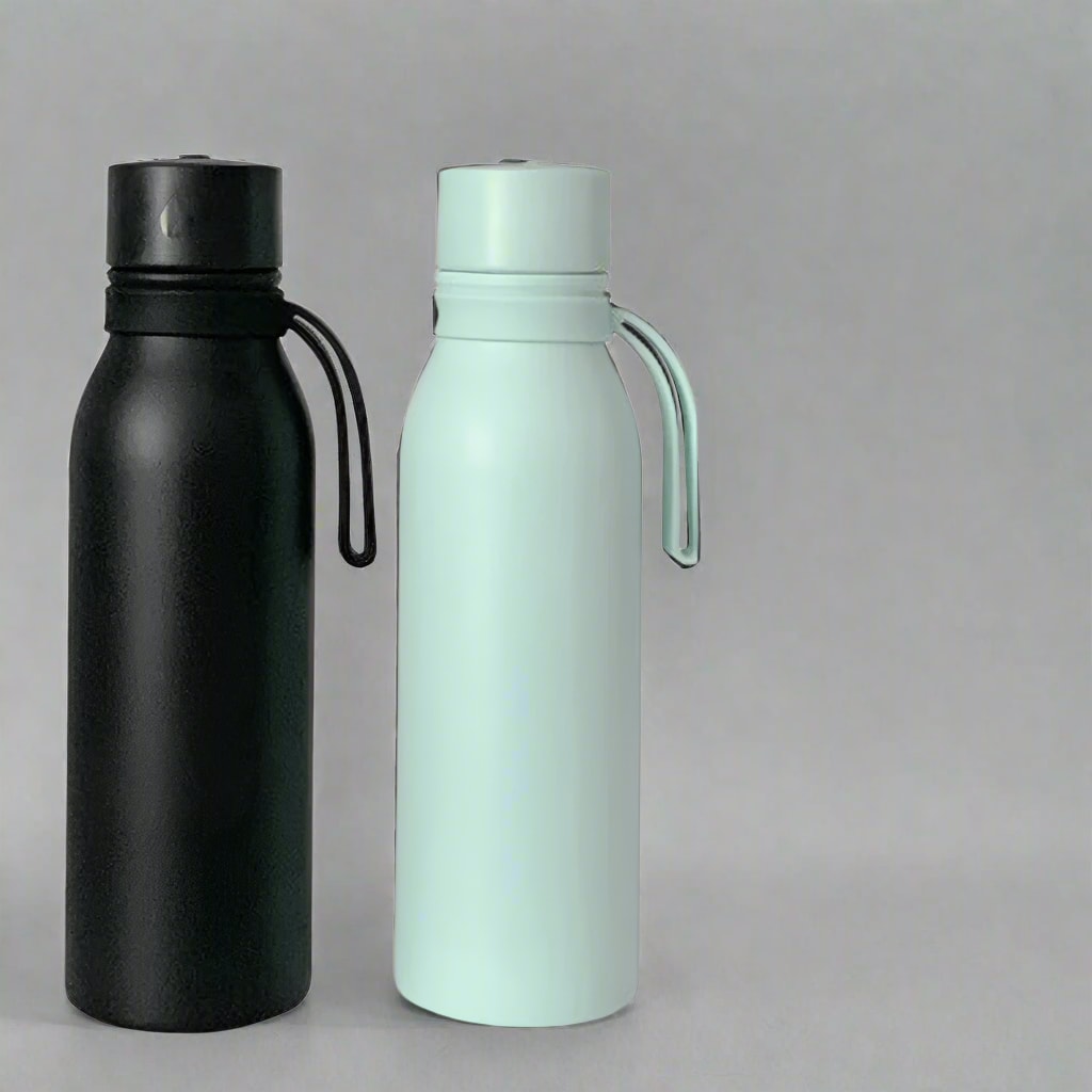 2 smart water bottles sold by 100 Spartans placed on a flat surface